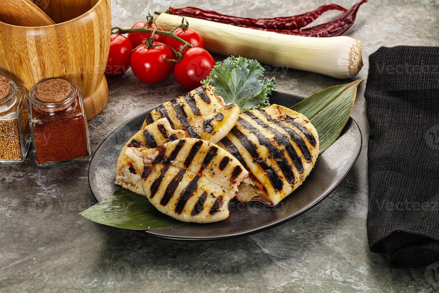 Grilled squid in the plate photo