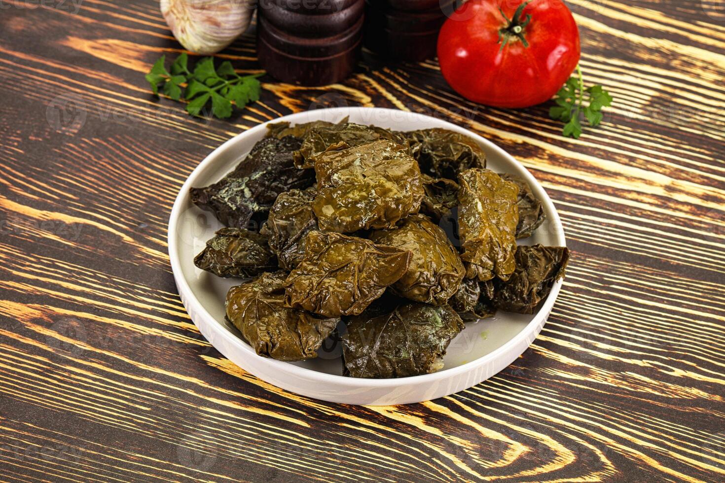 Stuffed dolma - meat in grape leaves photo