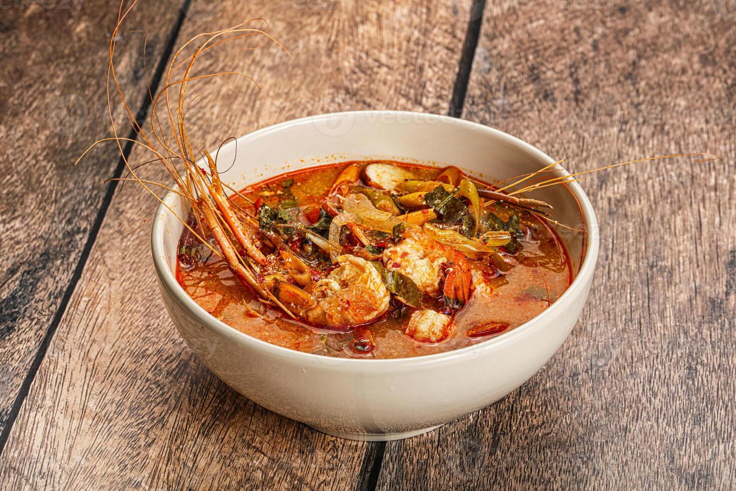 Thai traditional cuisine - Tom Yum soup photo