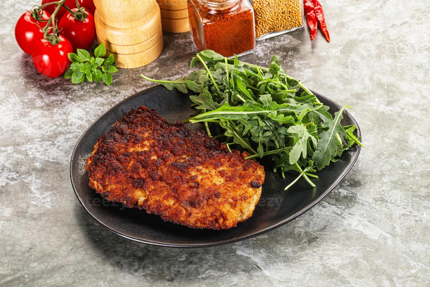 Tasty roasted breaded meat schnitzel photo