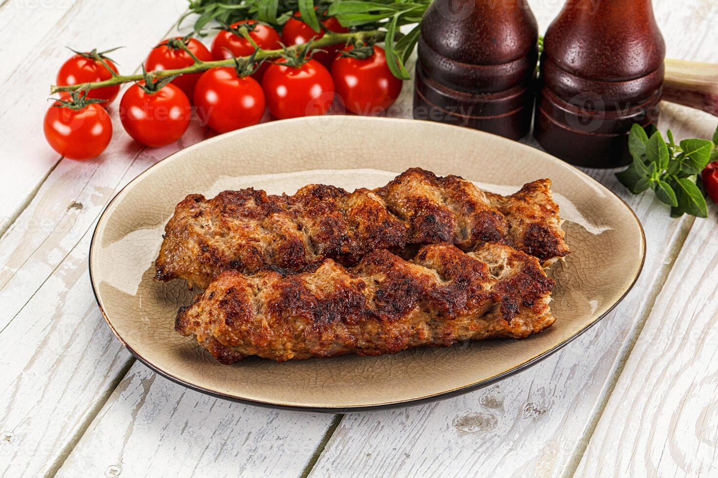 Chicken kebab minced meat and spices photo