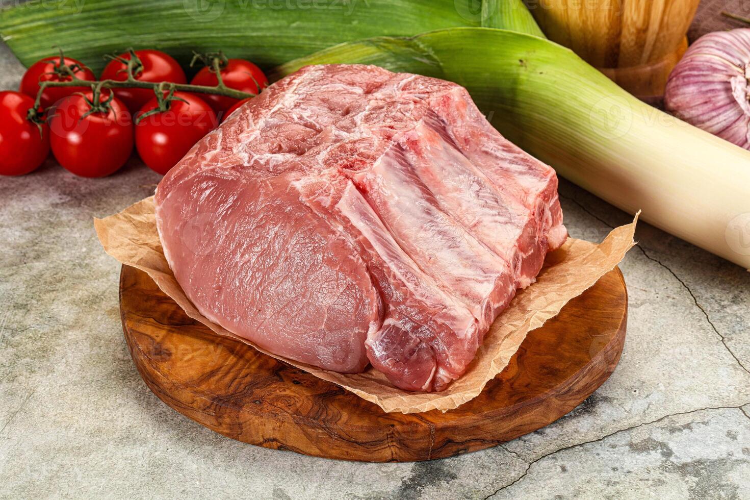 Raw pork loin cut with bone photo