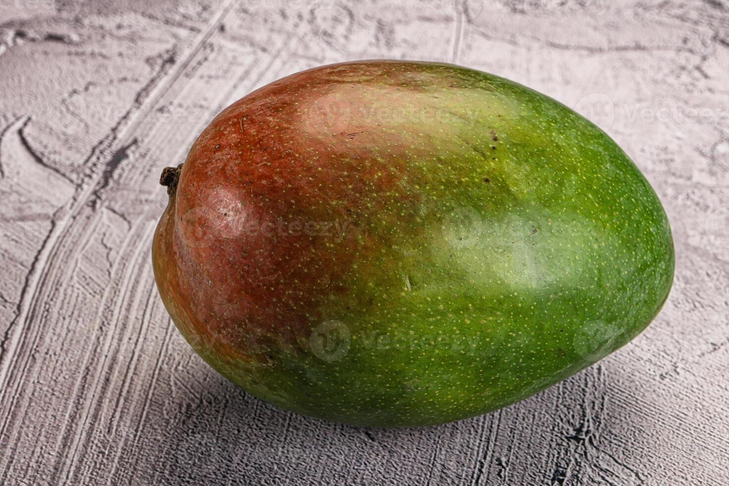 Sweet juicy green and red mango photo