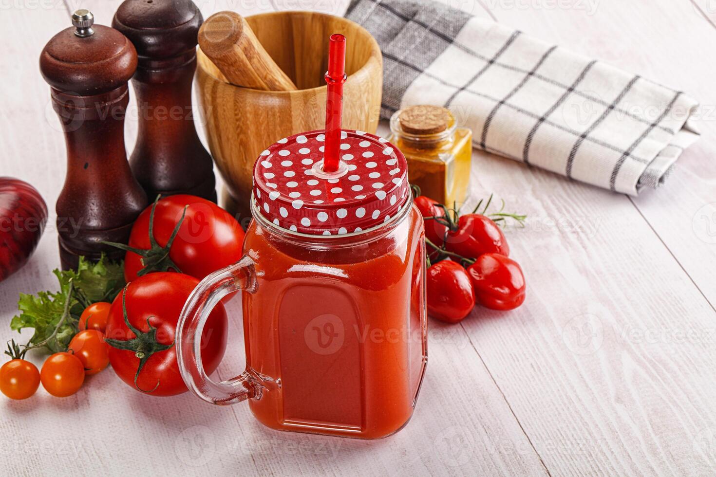 Fresh Tomato juice in the glass photo