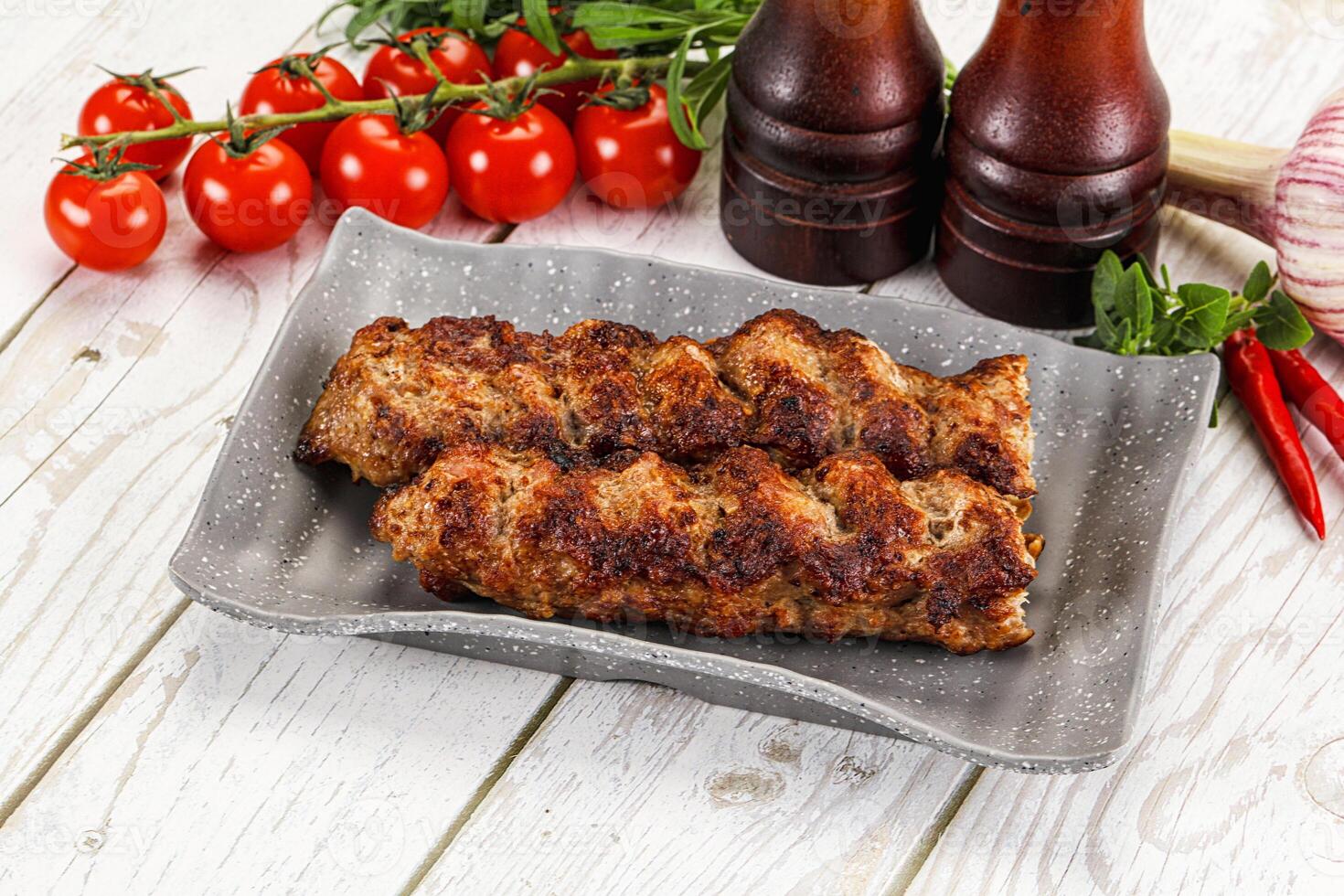 Chicken kebab minced meat and spices photo