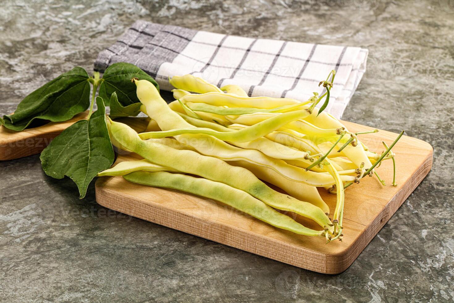 Raw green bean strings heap photo