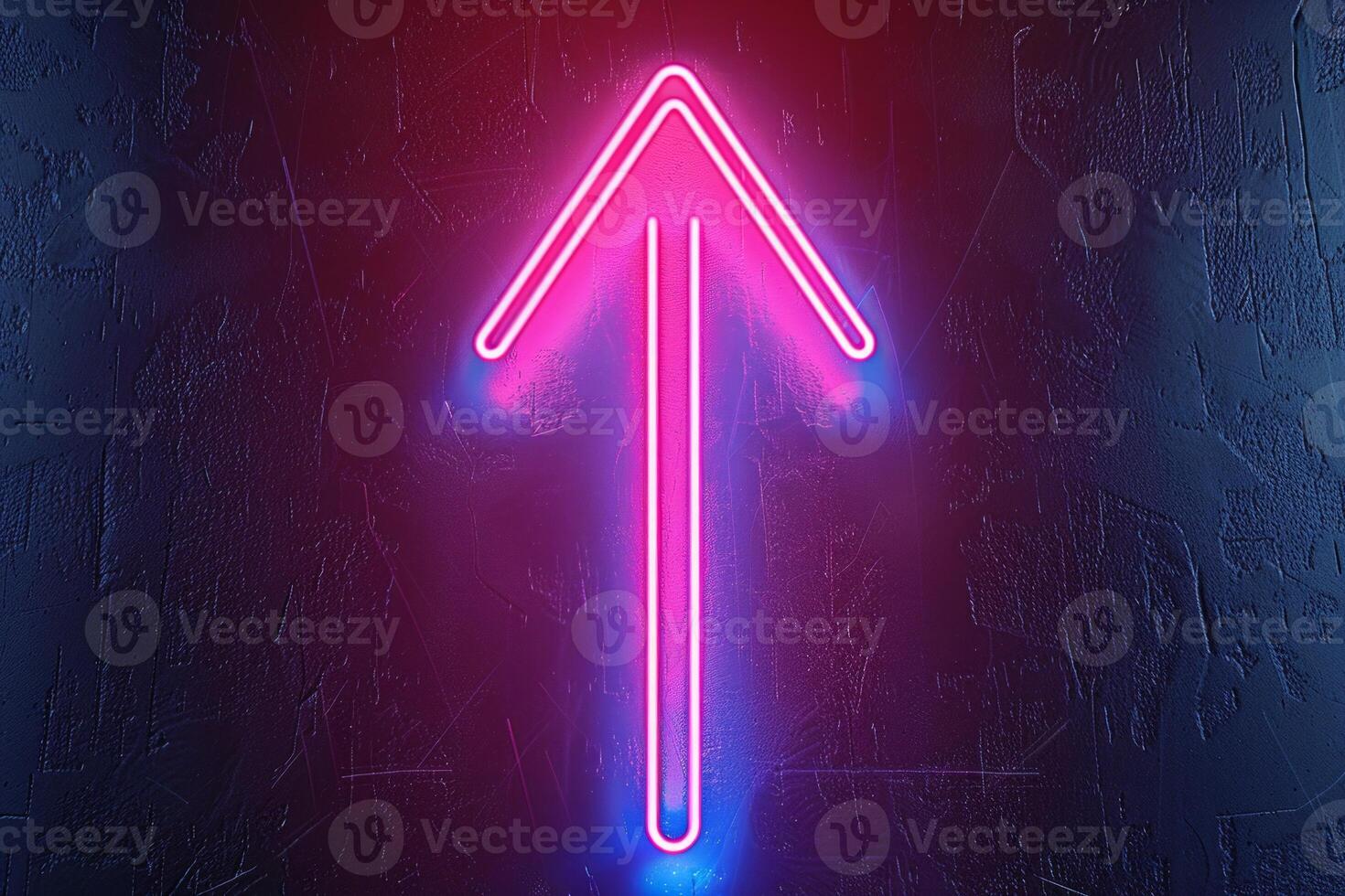 Neon pink arrow pointing up against a dark textured background photo