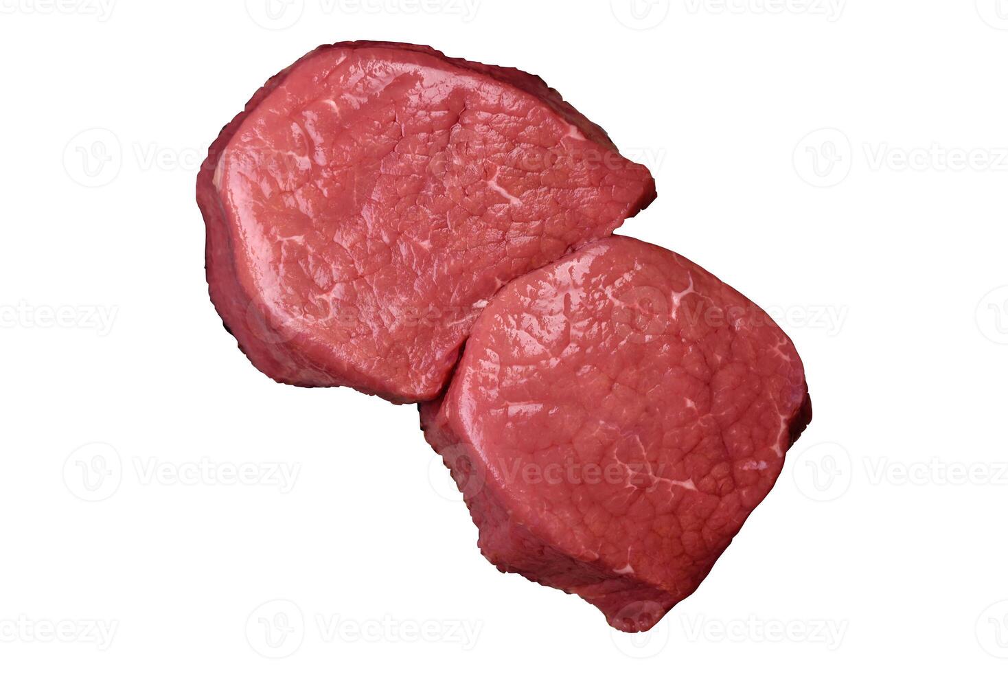 Raw beef eye steak round with salt, spices and herbs photo