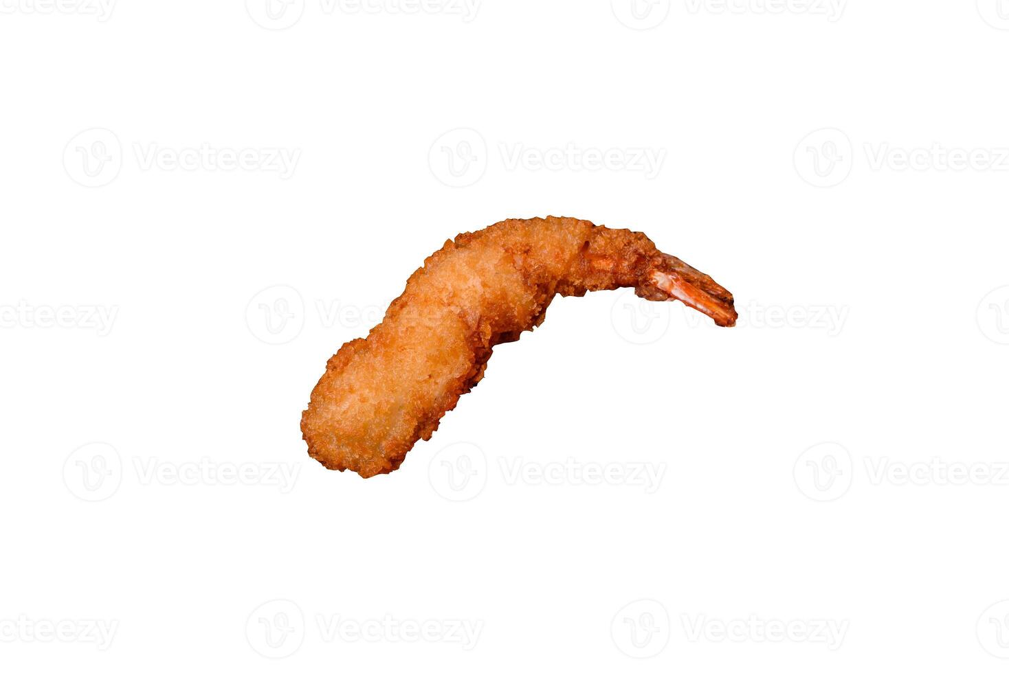 Hot crispy shrimp breaded with salt and spices with white sauce photo