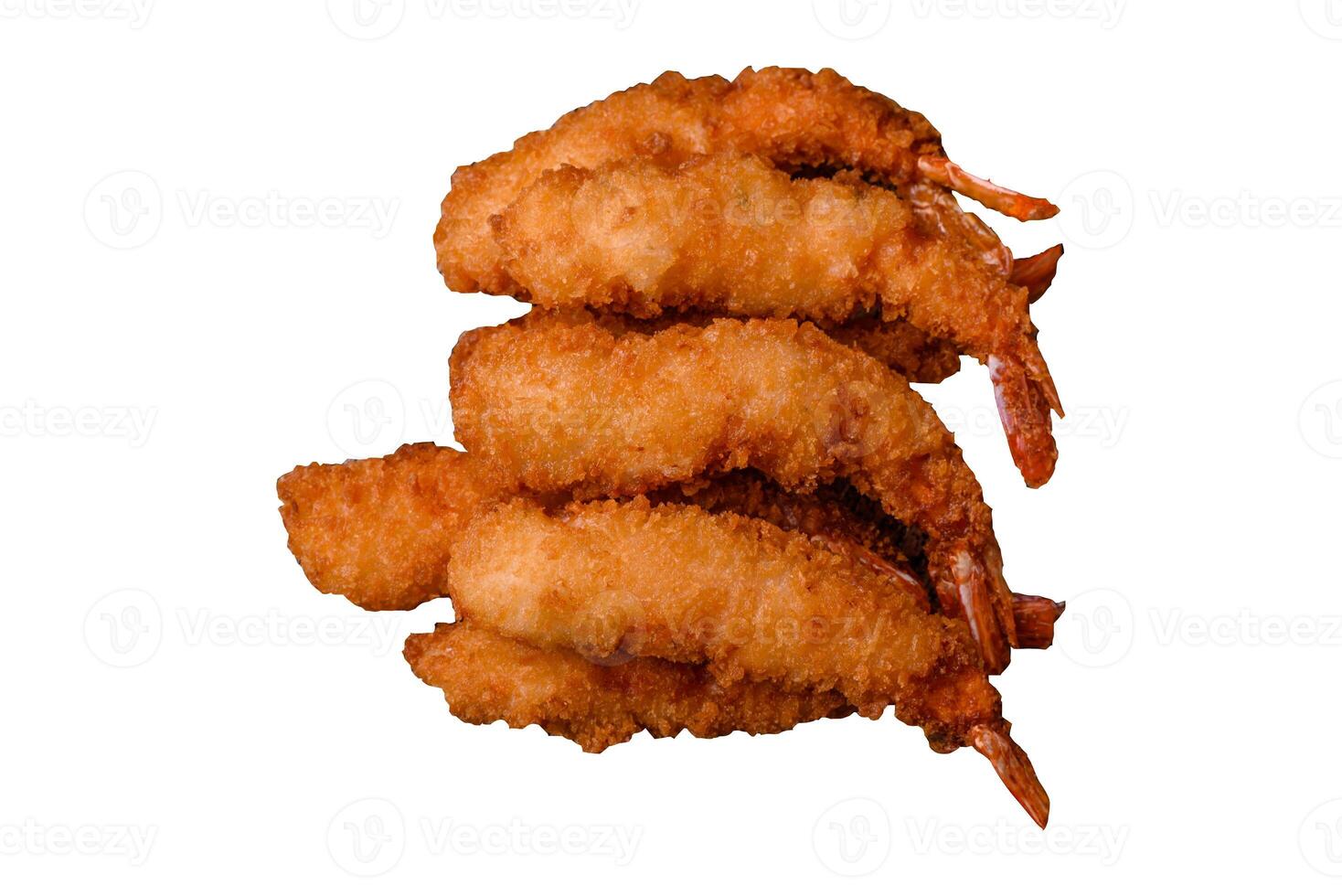 Hot crispy shrimp breaded with salt and spices with white sauce photo