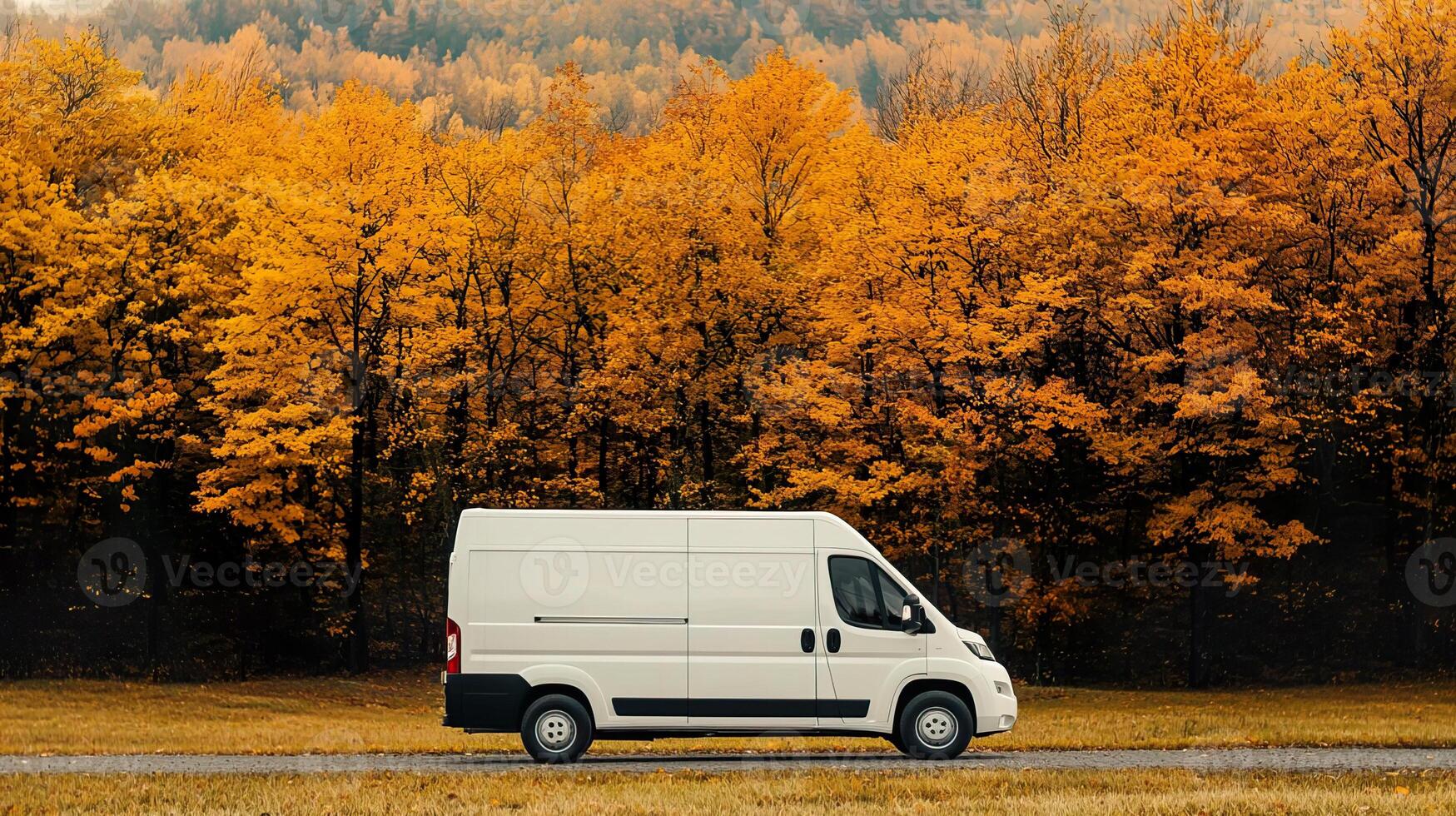 Modern delivery van parked in a picturesque park on a sunny autumn day. photo