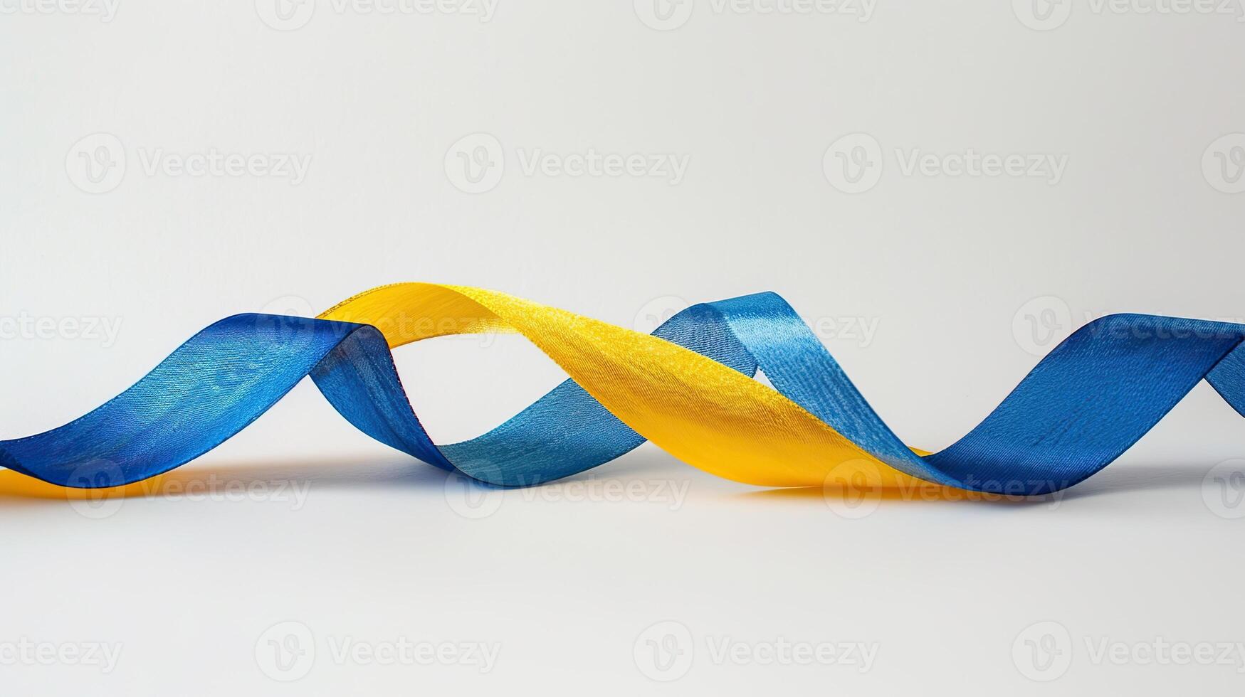 A single yellow and blue ribbon elegantly intertwined, symbolizing the colors of the Ukrainian flag photo