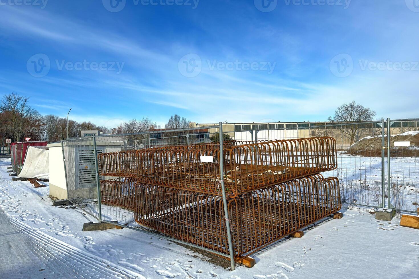 Reinforcement structures on a snow-covered construction site. photo