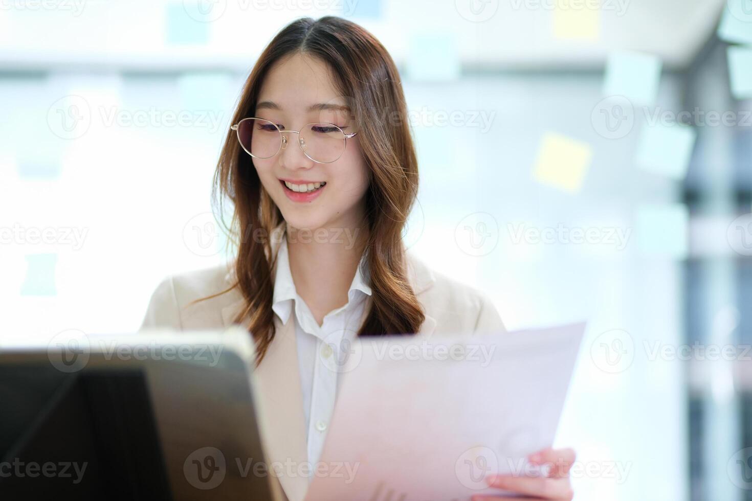 Businesswoman and entrepreneur using a tablet for data analysis and investment planning photo