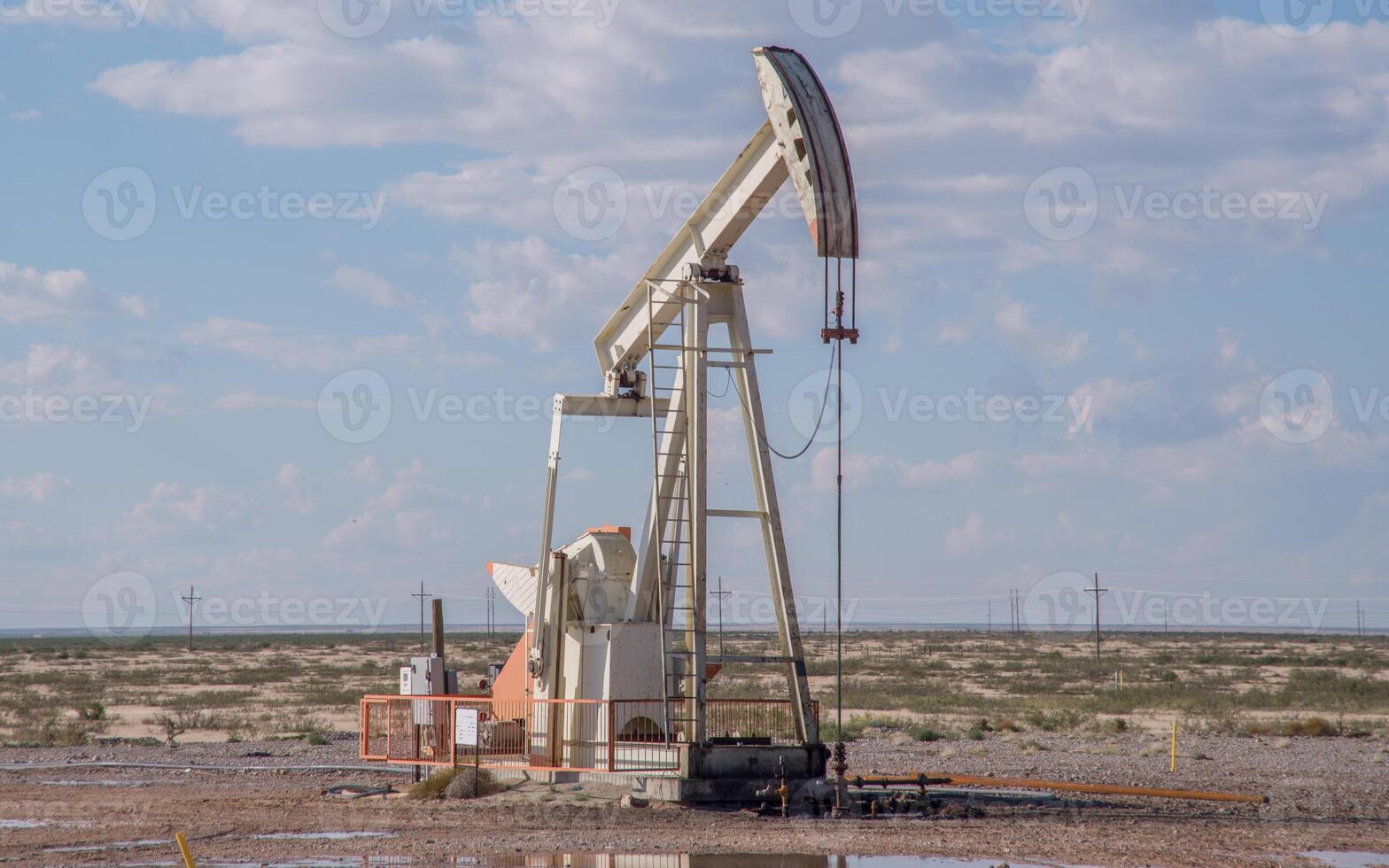 Grasshopper pump in a Texas oil field photo