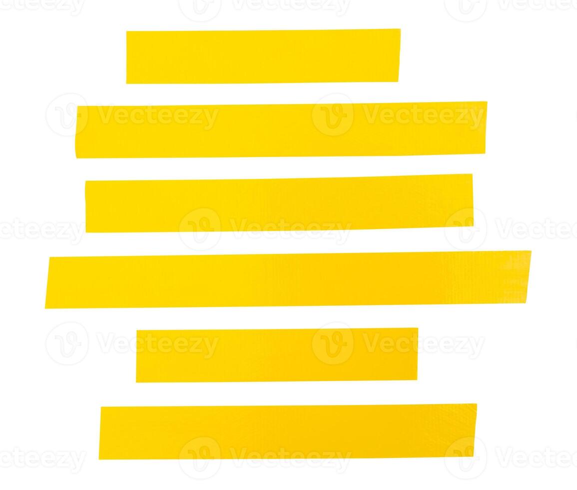 Top view set of yellow adhesive vinyl tape or cloth tape in stripes shape in straight lines isolated on white background with clipping path photo