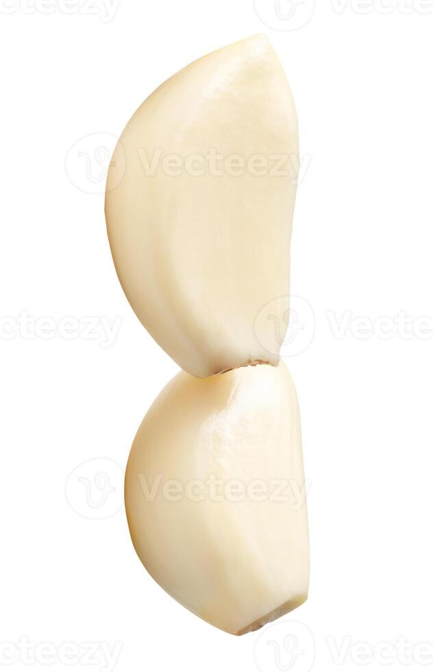 Top view of peeled garlic cloves in stack isolated on white background with clipping path photo
