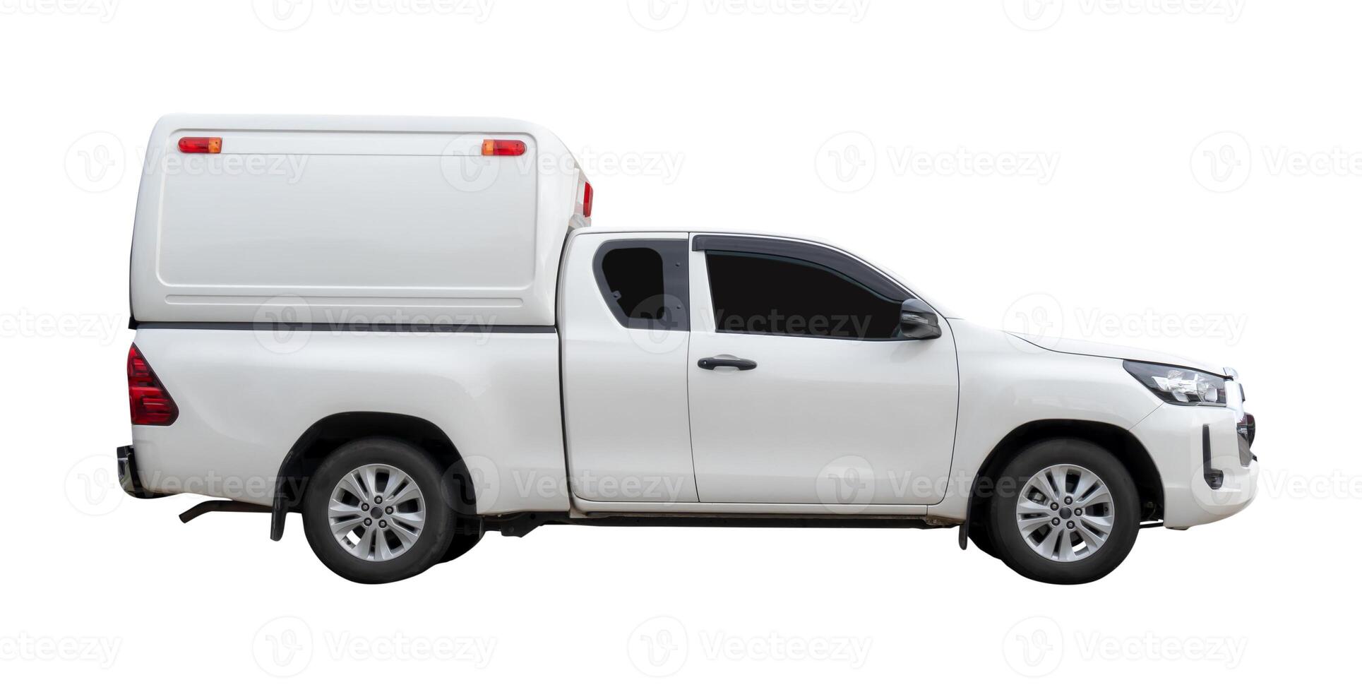 Side view of white delivery pickup truck with cab isolated on white background with clipping path photo
