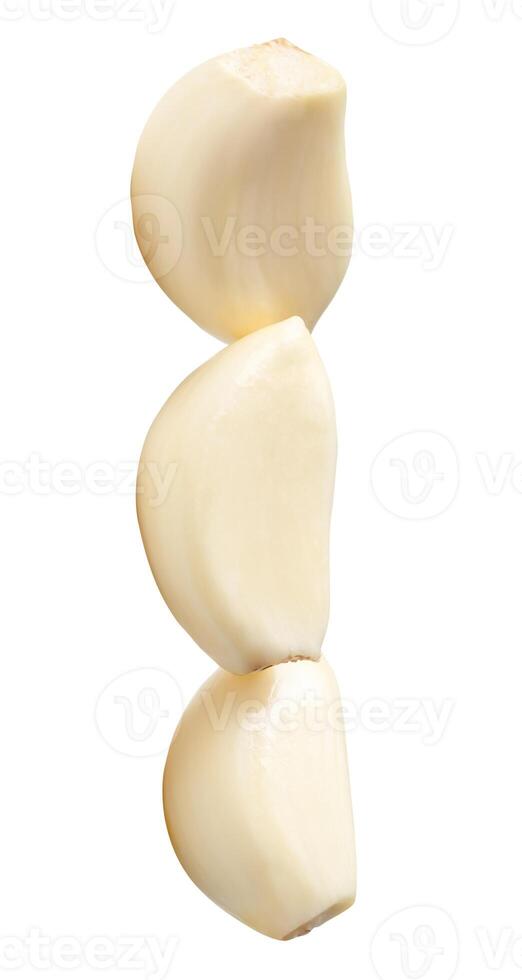 Top view of peeled garlic cloves in stack isolated on white background with clipping path photo