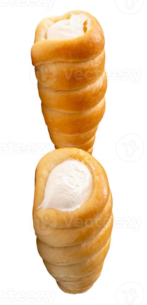 Top view of two puff pastry cream horns isolated on white background with clipping path photo