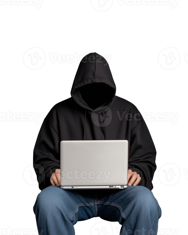 Mysterious figure in black hoodie using laptop on transparent background png
