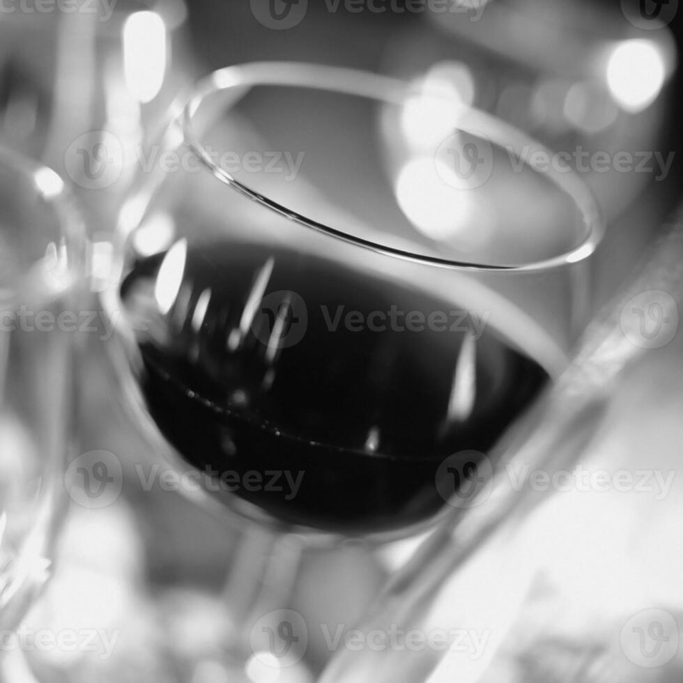 Red wine in a glass close view background photo