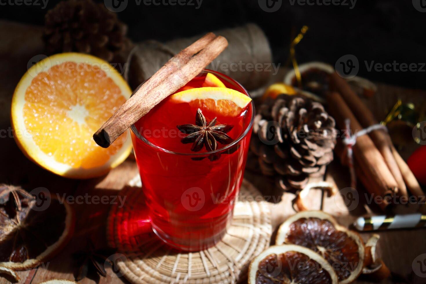 Mulled wine with fresh orange sliced. Traditional hot drink in Christmas time. photo