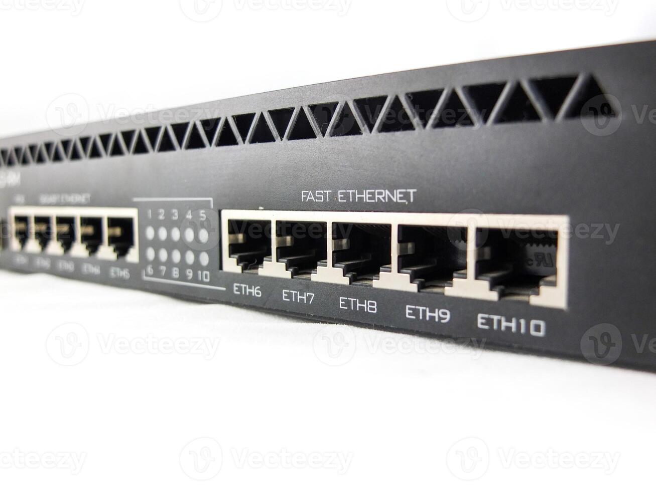 Closeup ethernet ports on black router with white background photo