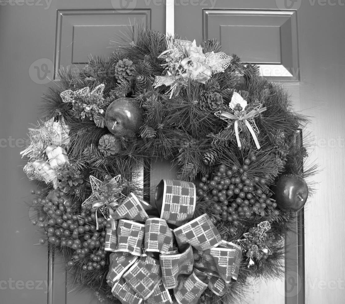 Christmas Ornament with Plant and Twig in Window Display photo