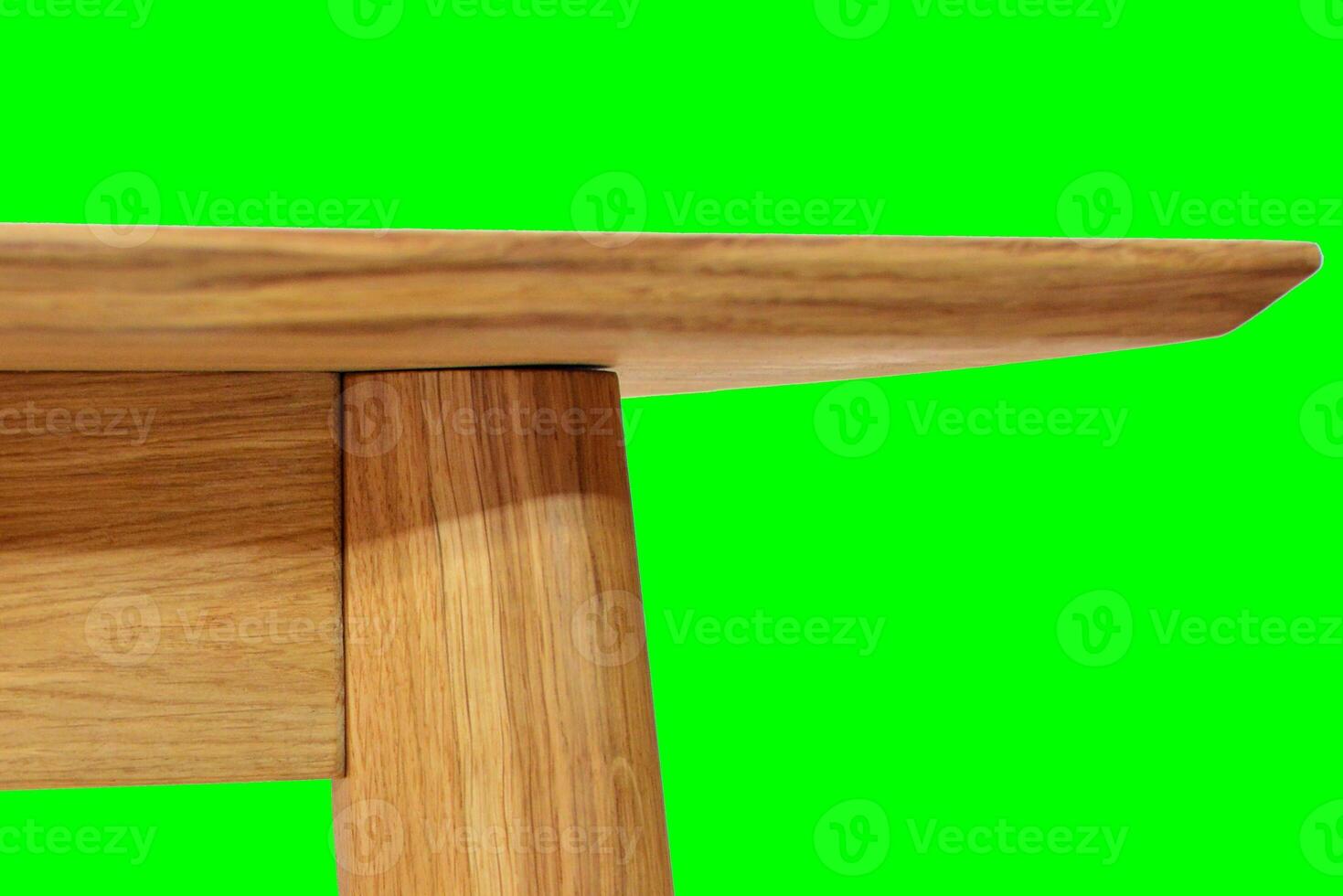 Wooden dinner table surface. Natural wood furniture close view. Tabletop isolated over green screen chroma key background photo