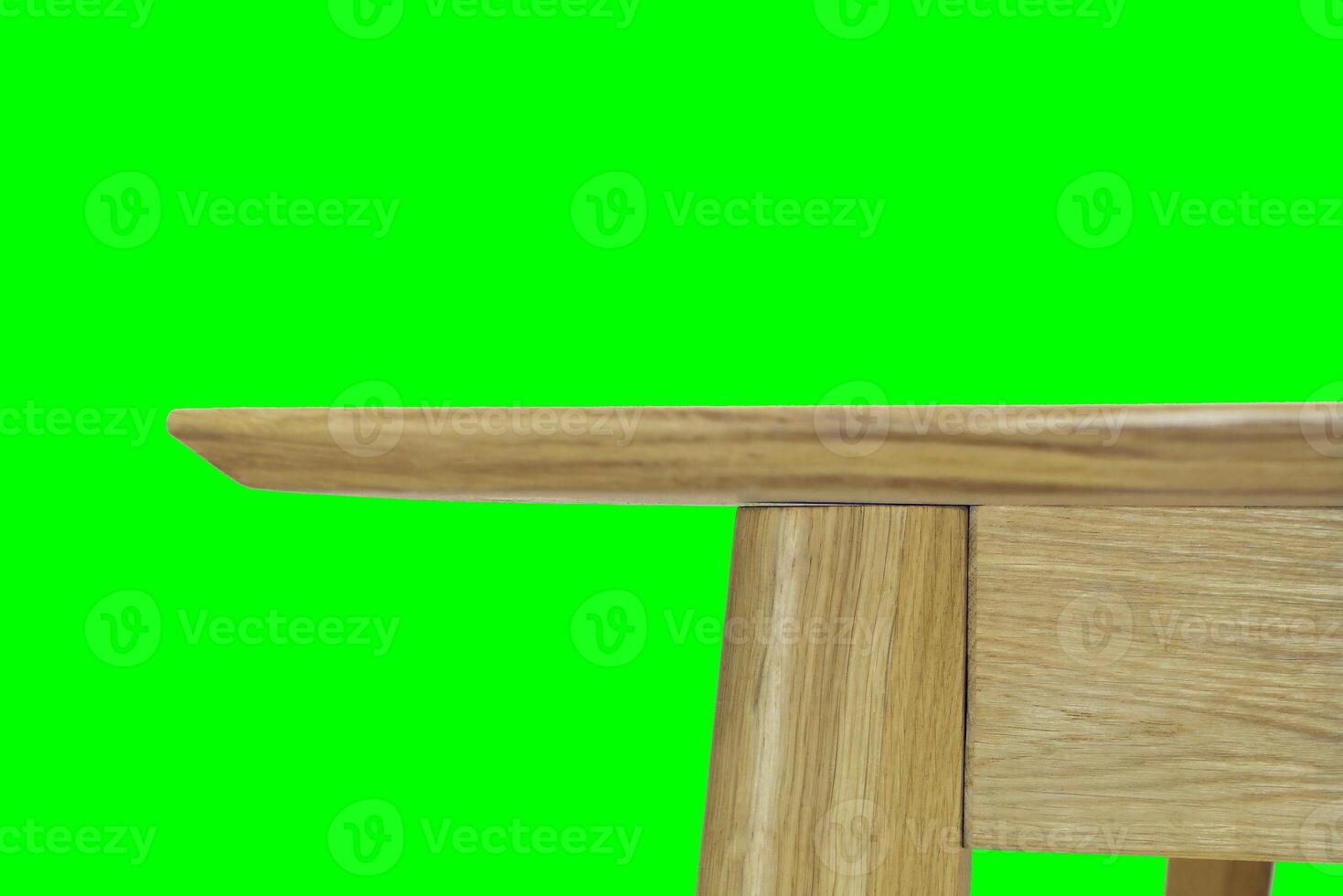 Wooden dinner table surface. Natural wood furniture close view. Tabletop isolated over green screen chroma key background photo