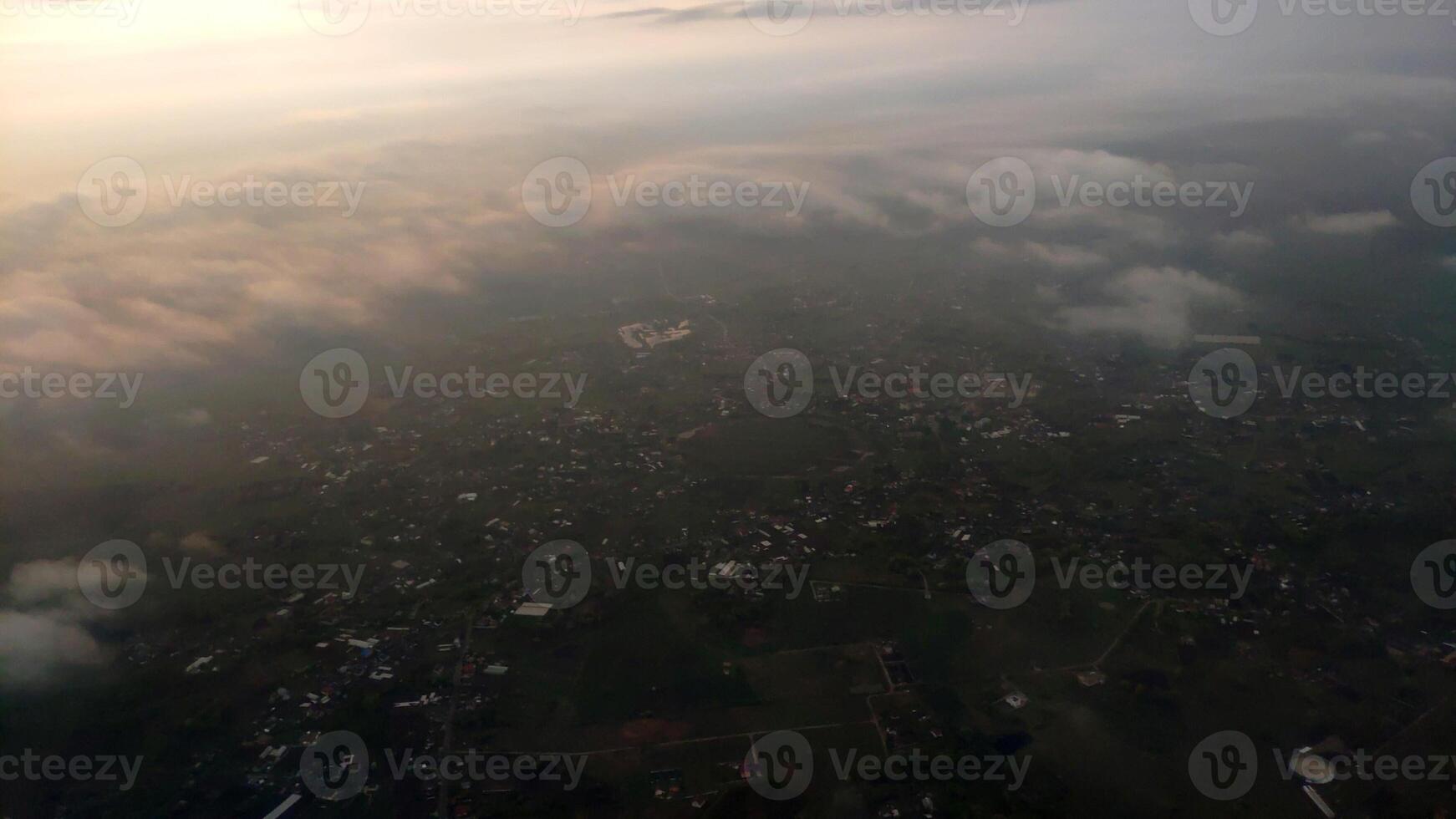 Cloudy sky as it is seen from the airplane photo