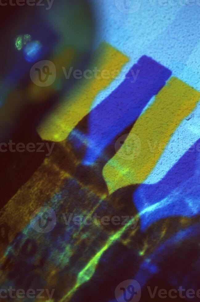 Vibrant Liquid Art. A Dance of Electric Blue and Magenta Glass photo