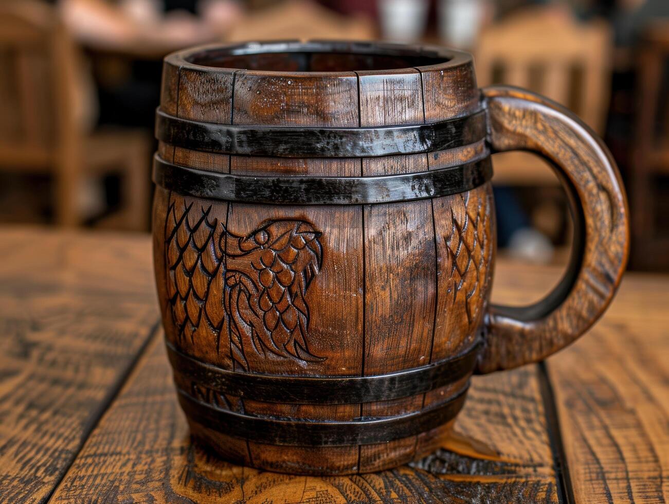 Ornate wooden beer mug with carved design photo