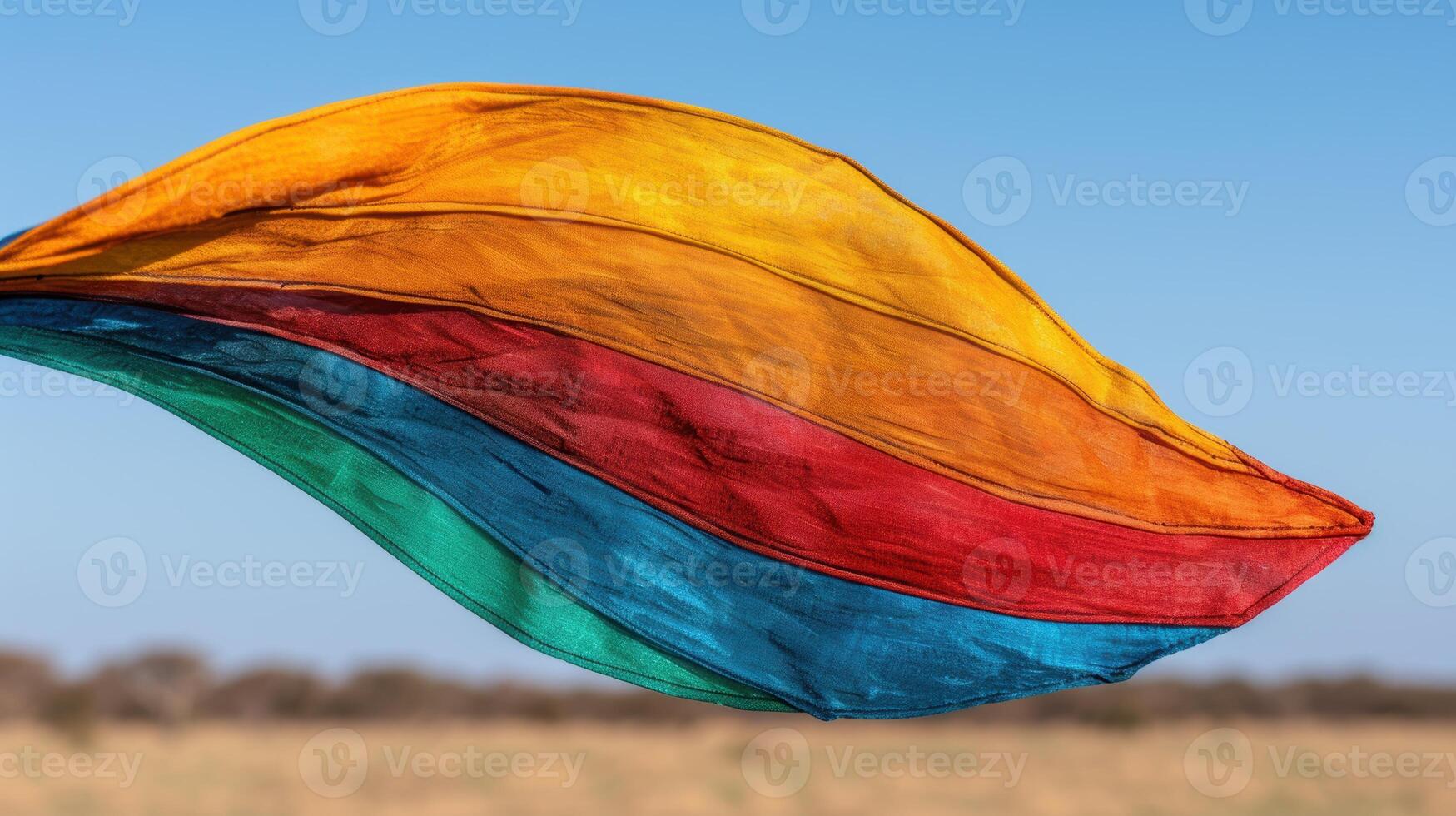 Colorful fabric blowing in the wind photo
