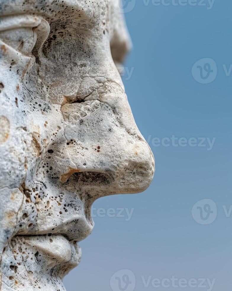 Close up of a weathered and textured stone face photo