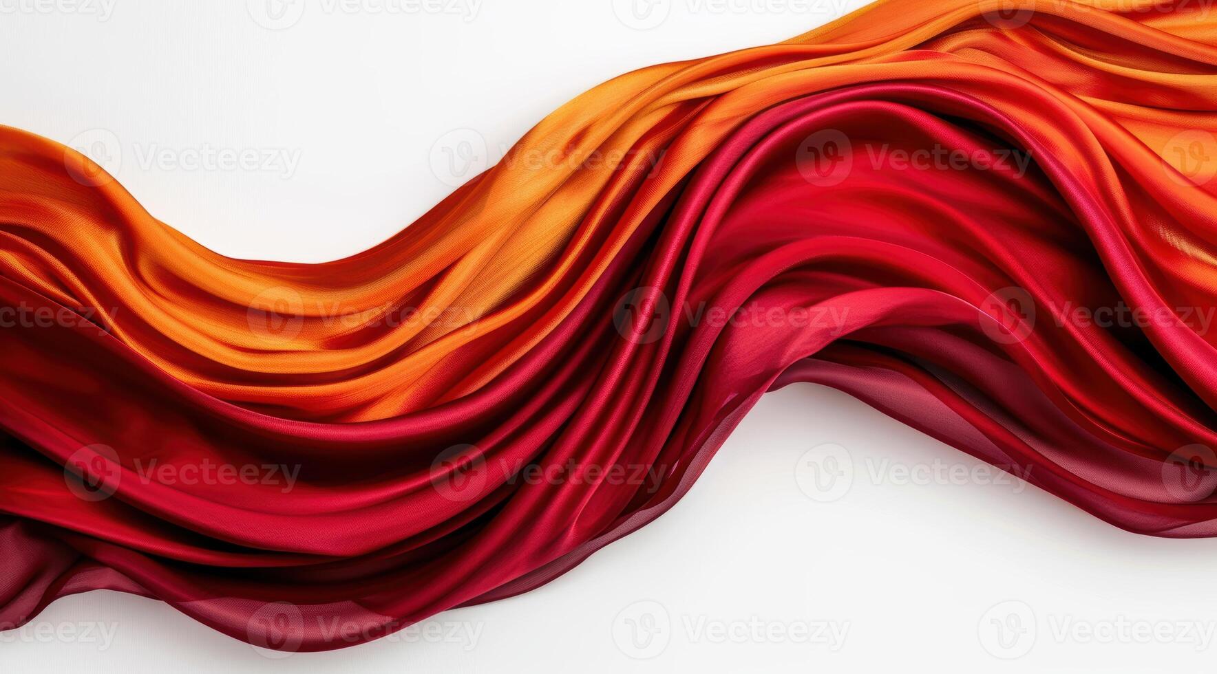 Vibrant red and orange fabric flowing photo
