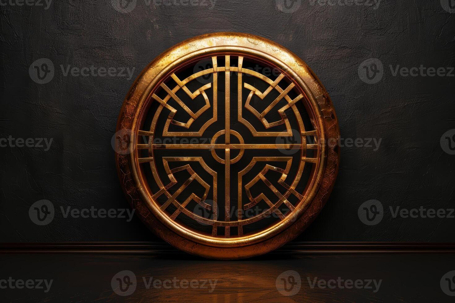 Ornate golden circular symbol on dark background photo