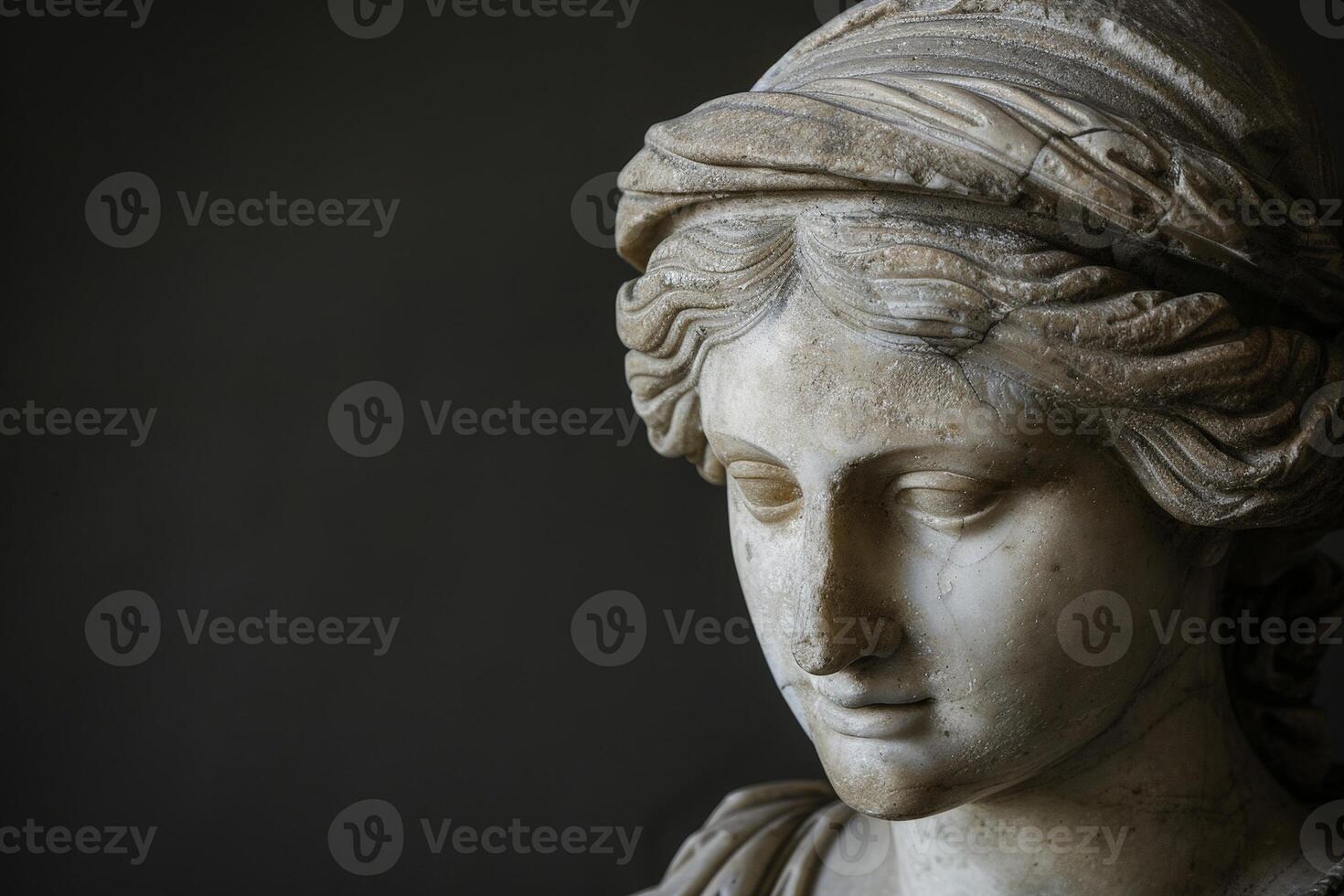 Closeup of a classical marble statue head photo