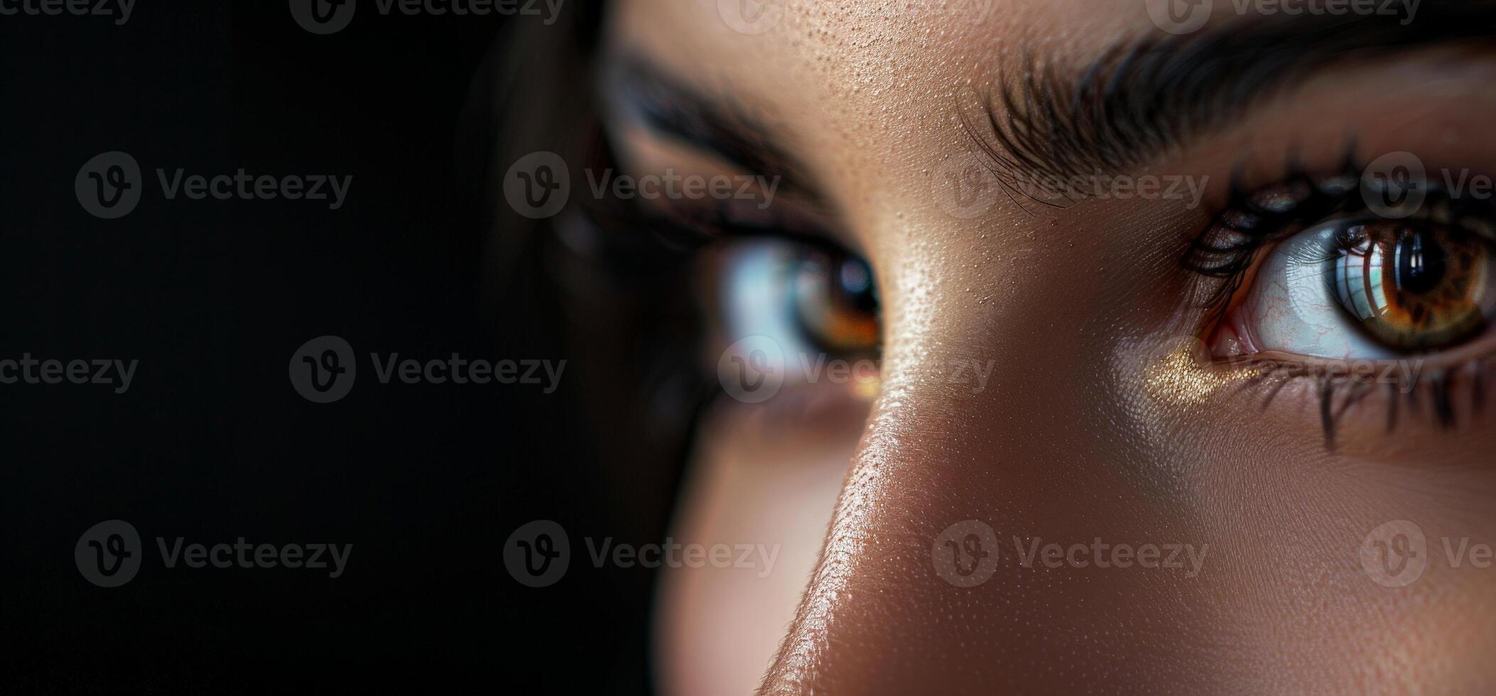 close up of a human eye with long eyelashes photo