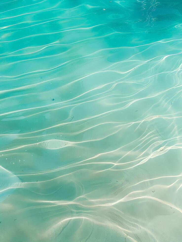 Tranquil turquoise waters with rippling reflections photo