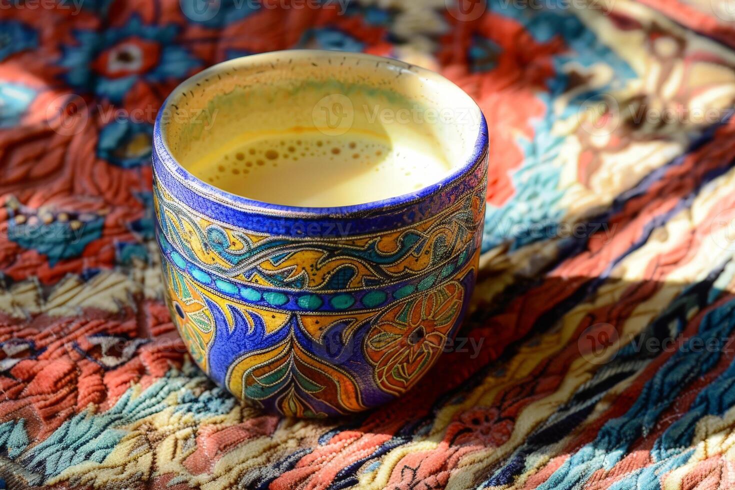 colorful patterned mug with hot beverage photo