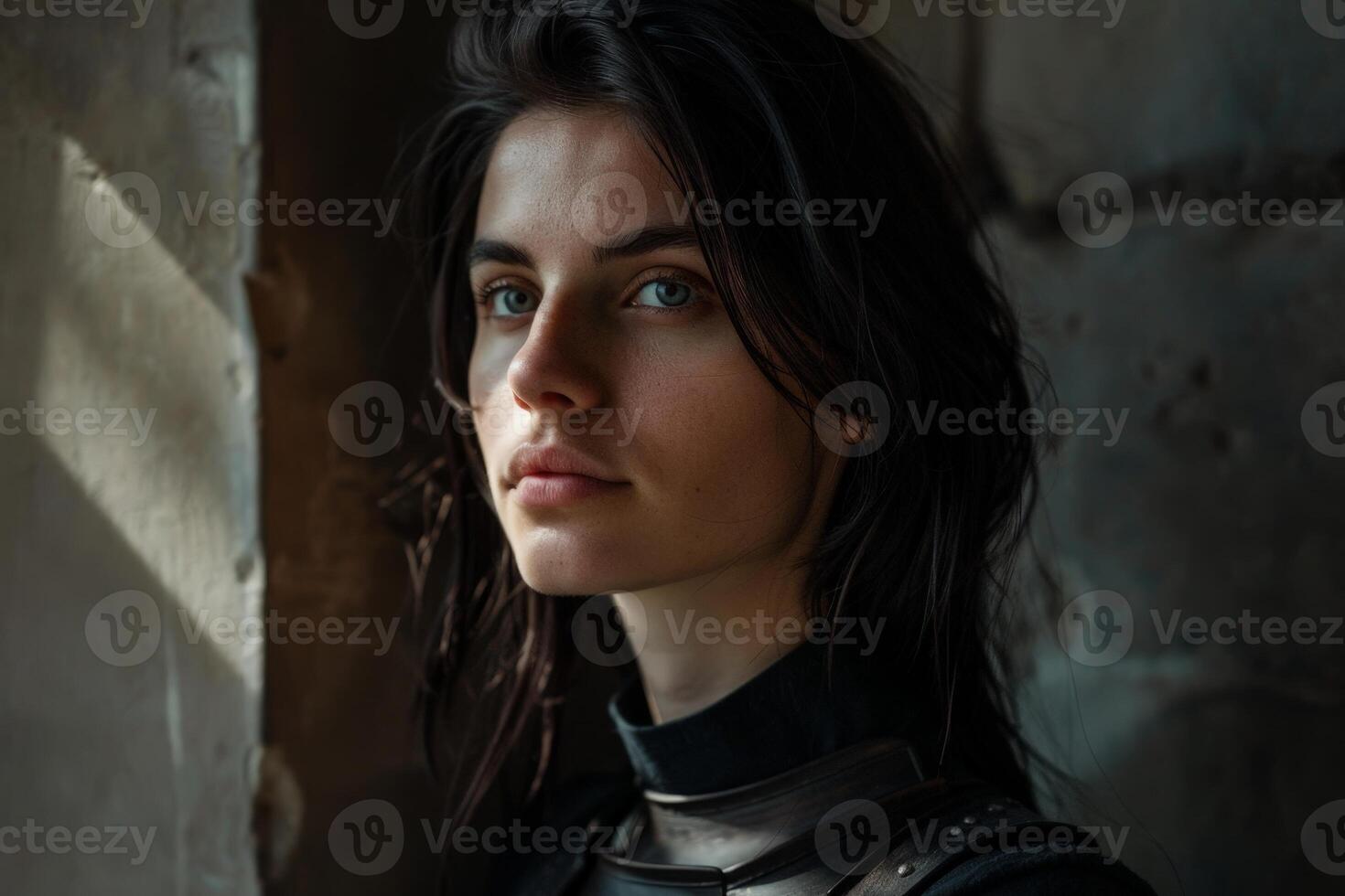 Thoughtful young woman with dark hair photo