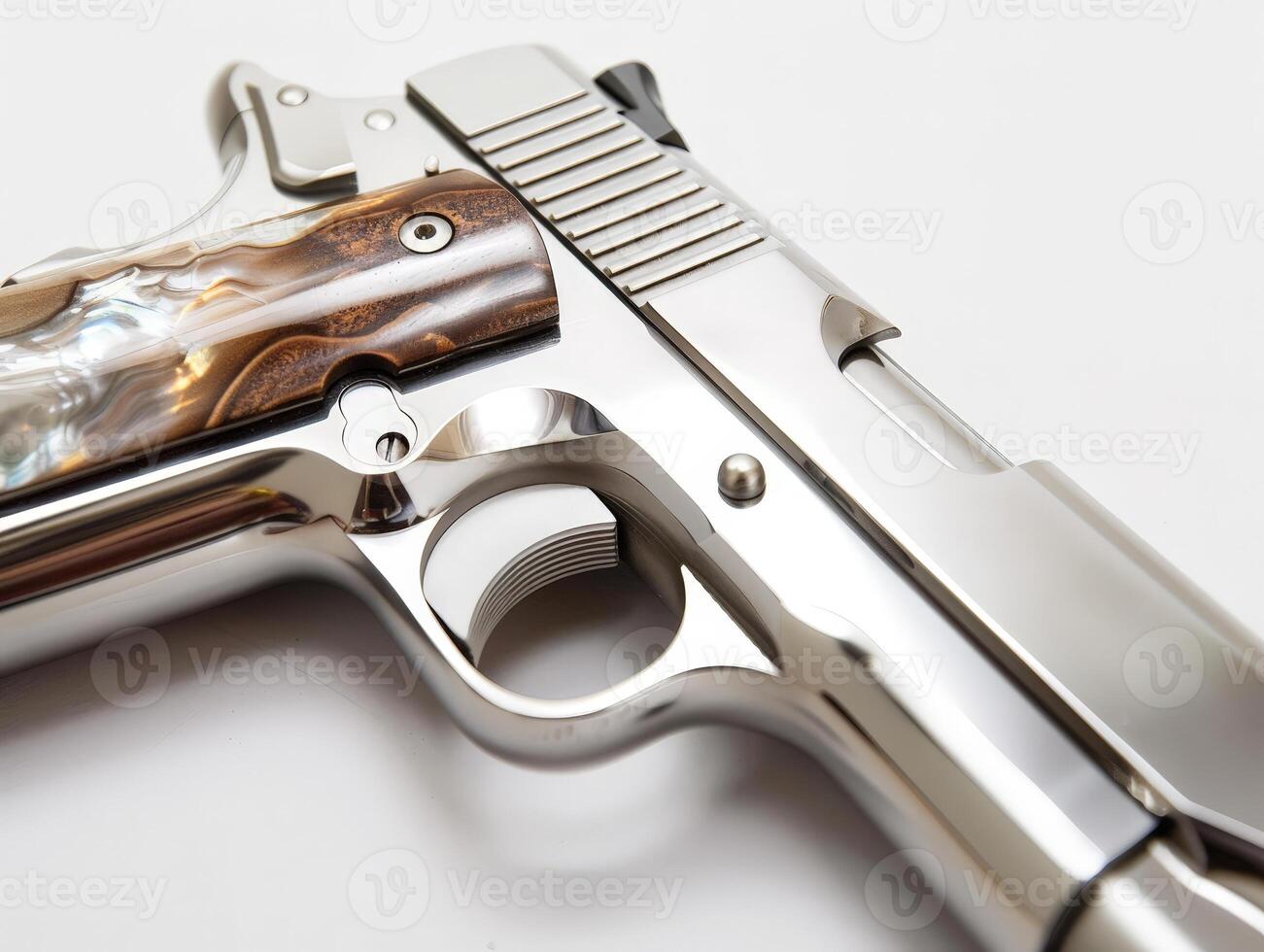 Close up of a handgun with a wooden grip photo
