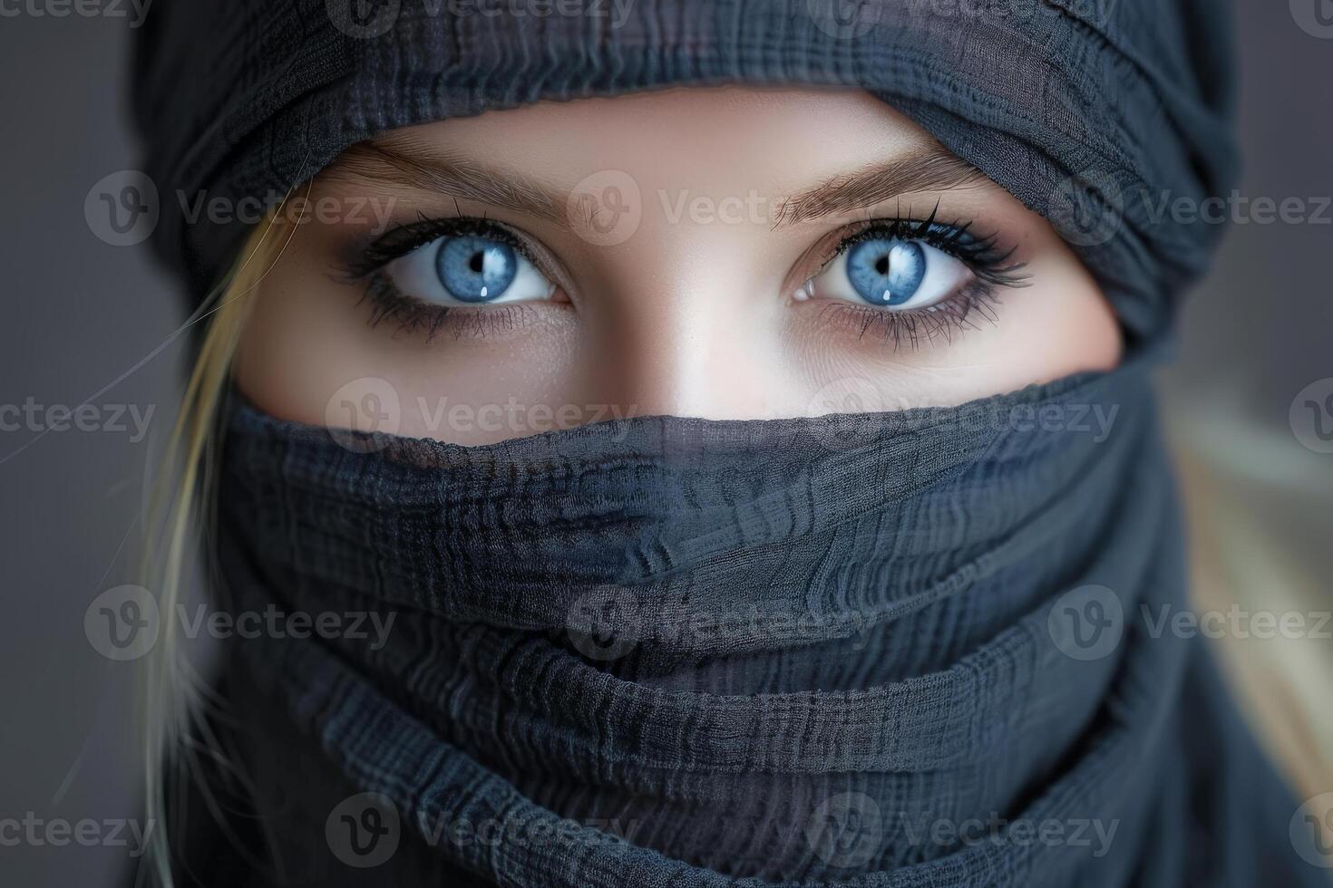 Mysterious eyes behind veil photo