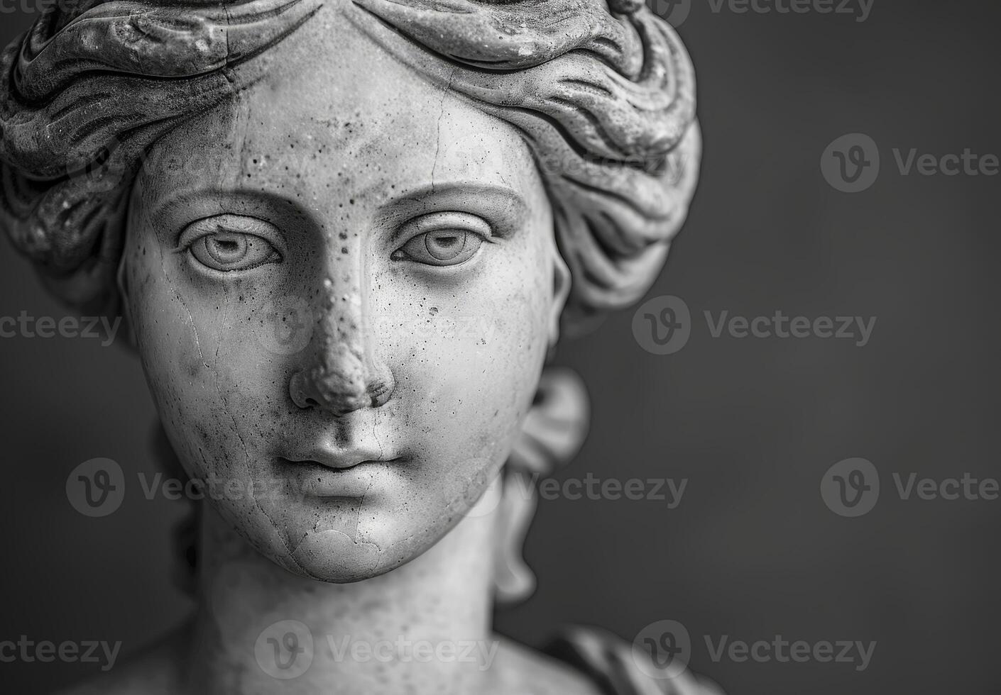Detailed close up of a weathered stone statue photo