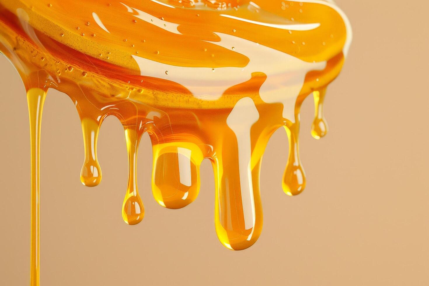 Dripping honey or golden syrup photo