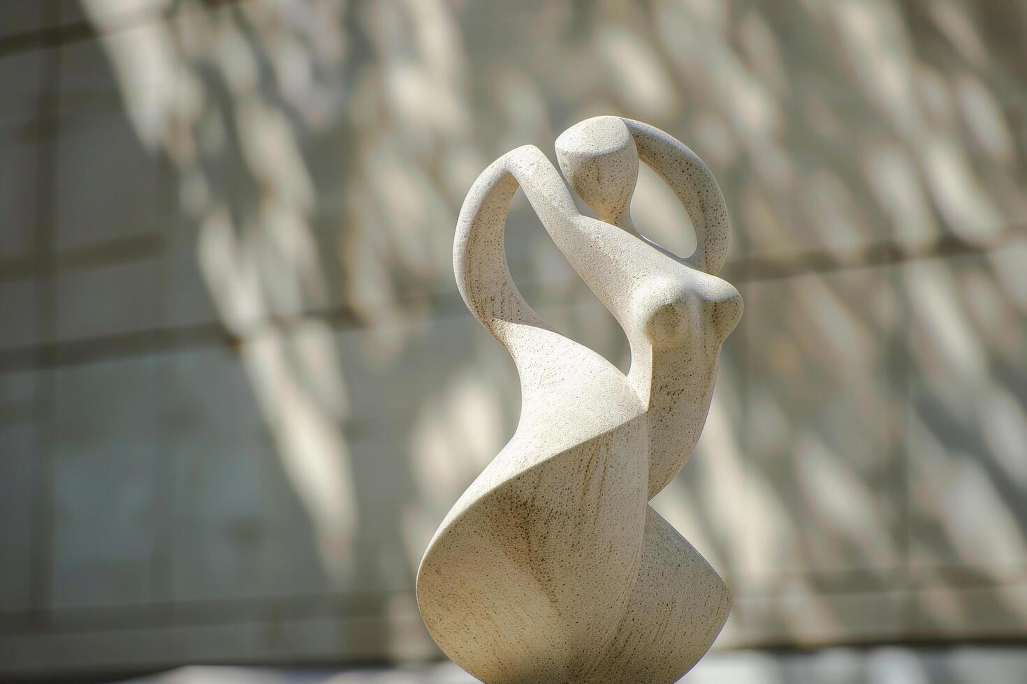 abstract stone sculpture in natural light photo