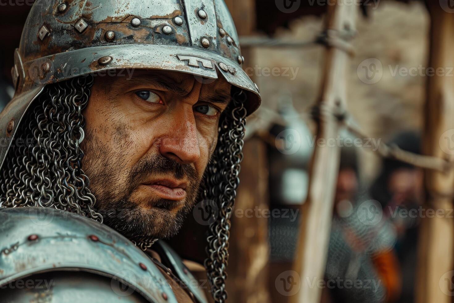 Rugged medieval warrior in armor photo