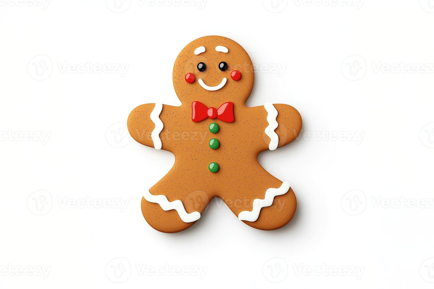 Smiling gingerbread man cookie decorated with icing on white background. Christmas and holiday concept photo